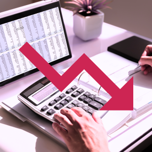 A large red downward arrow sitting over top of a person looking at transactions and making calculations, to signify a reduction in P2P efficiency.